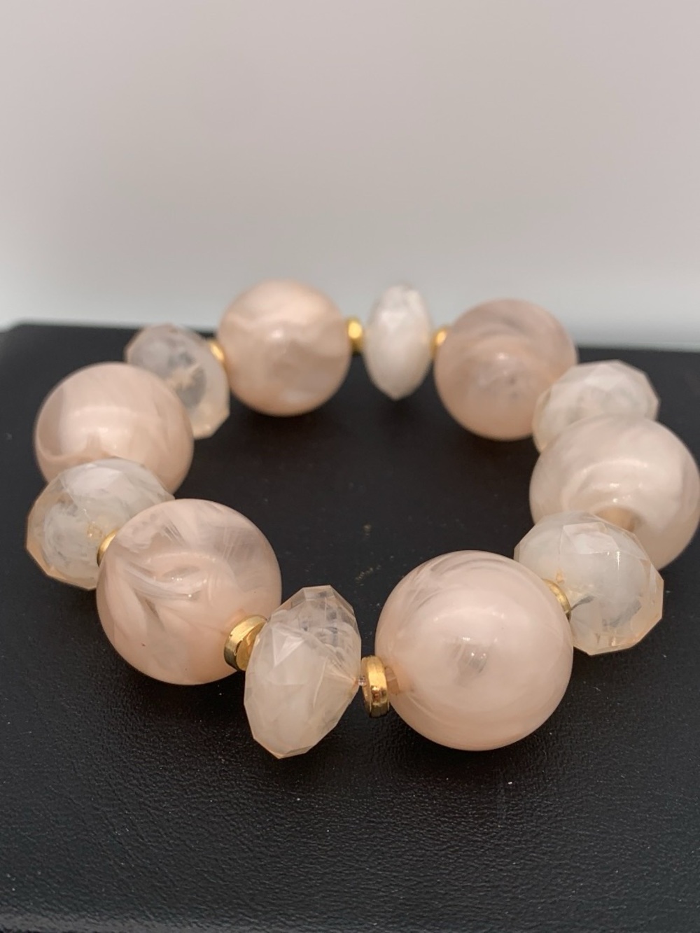 Chunky Elegant Pink swirl Bead Stretch Bracelet with gold tone accents